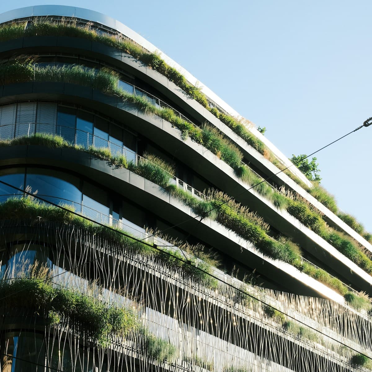GREEN BUILDING CONSULTANCY — Planted terraces · Green facade